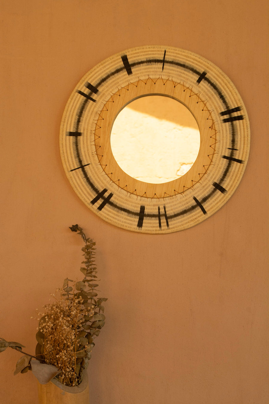 Bespoke round palm mirror. Handmade in Colombia.